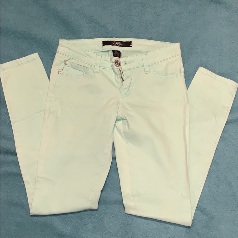 Mint colored skinny jeans